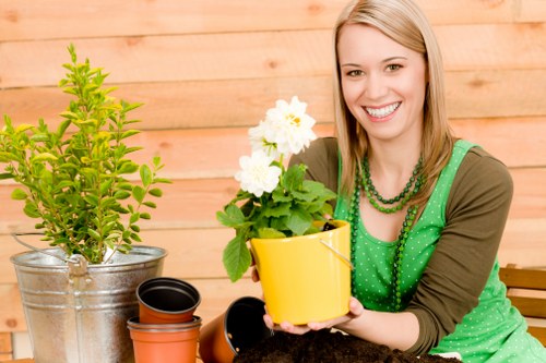 Professional landscaper designing a detailed garden plan